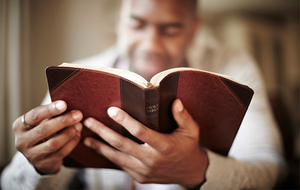 Man reading the Bible